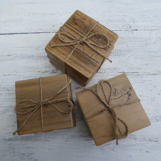 3 sets of rustic Cedar wood coasters, each wrapped with natural twine