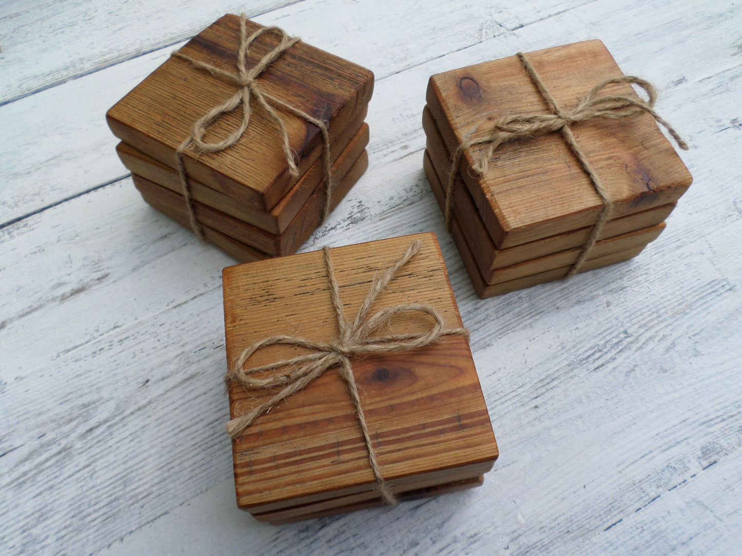 three set of coasters wrapped with natural twine