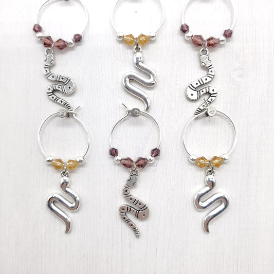 six snake wine charms with crystal beads and silver spacings