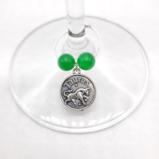 Taurus wine charm with Emerald glass beads on a glass