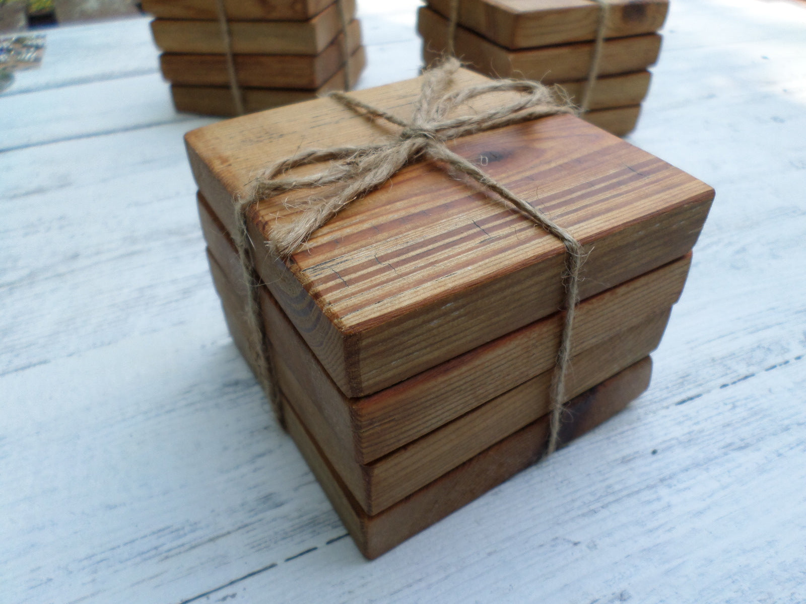 set of 4 coasters wrapped in natural twine