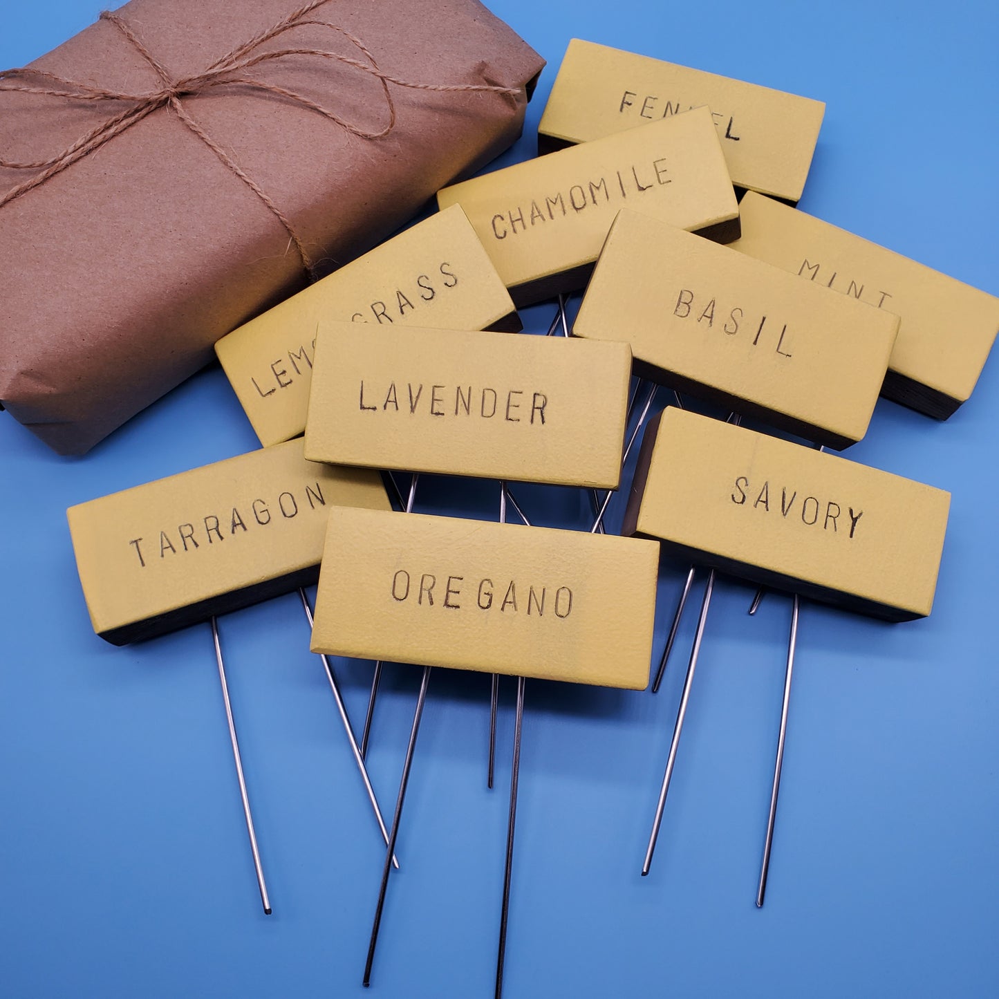 set of yellow rustic garden markers