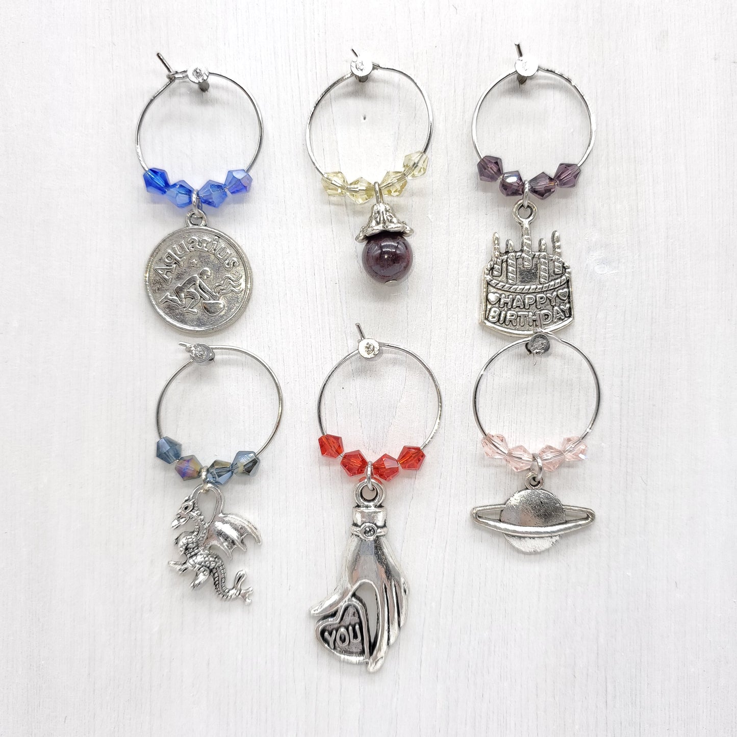 set of 6 Aquarius birthday wine charms year of dragon born in January