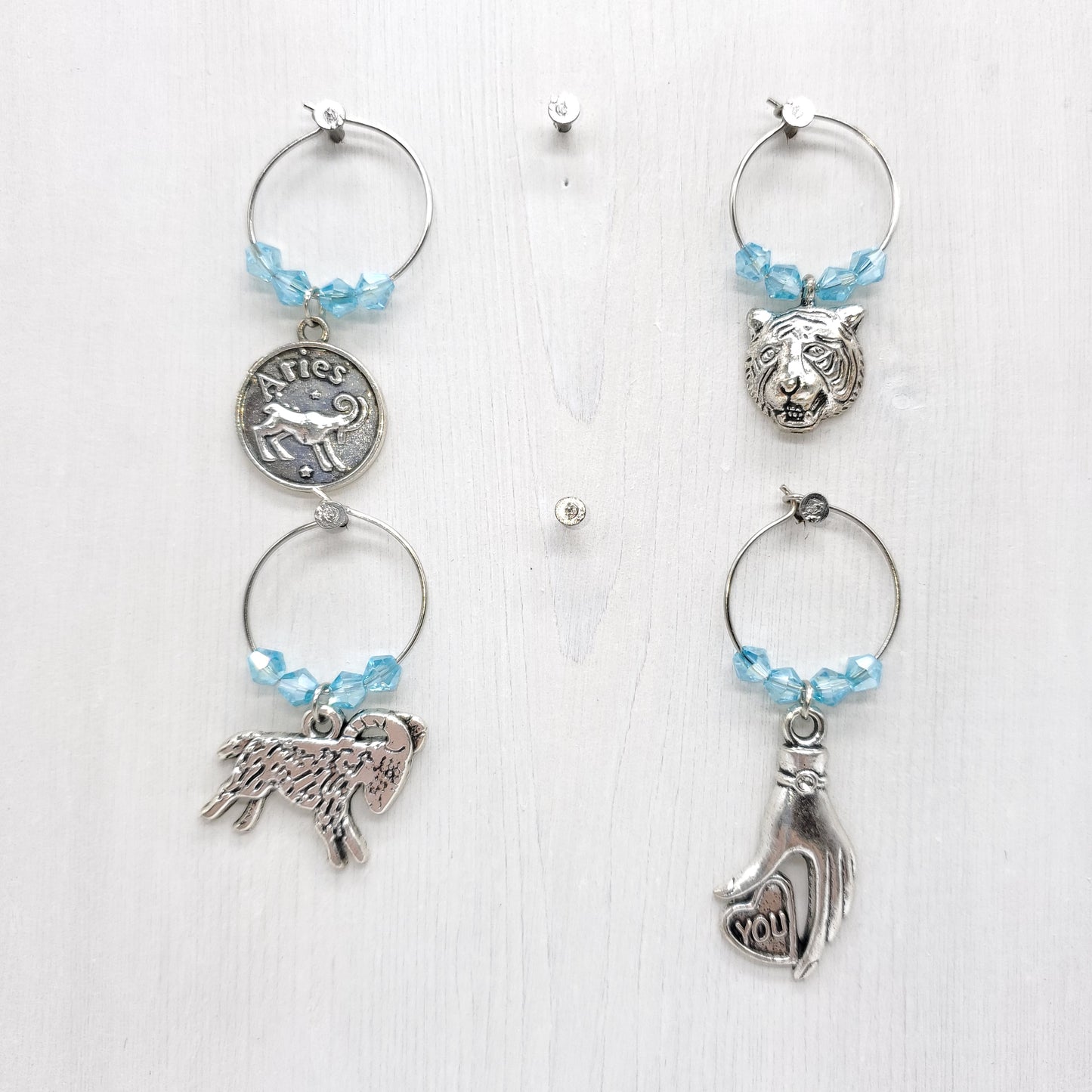 set of 4 Aries birthday wine charms year of tiger with pale blue crystal beads