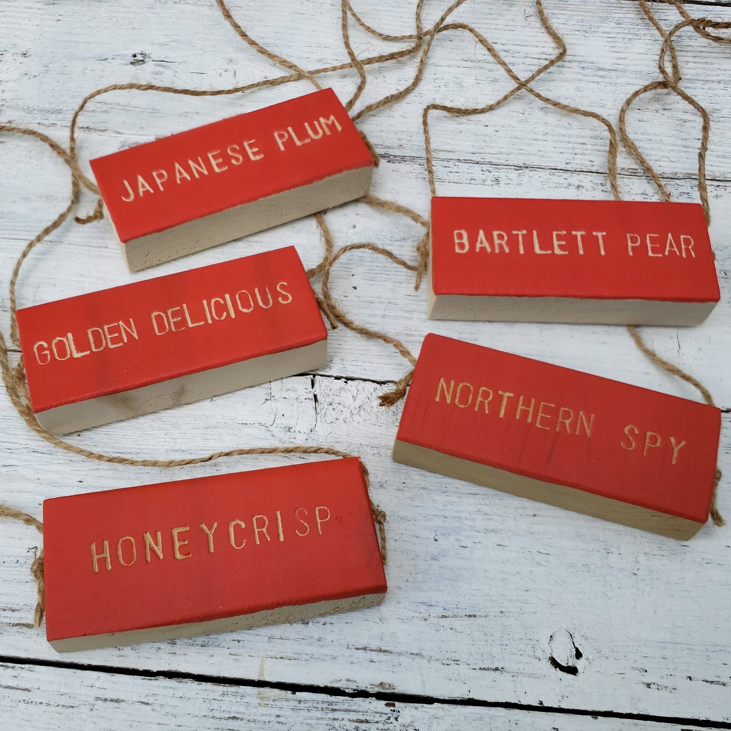 red wooden tree markers